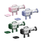 Four toy space guns in different colors on a white background