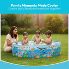 Family playing in a inflatable pool with a scenic background